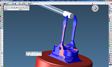 GibbsCAM Cut Part Rendering (CPR) verifies toolpath, both in process, and after programming is complete, showing different operations in different colors, as the user chooses. This rotated view shows the 4-axis toolpath as it machines a medical clamp.