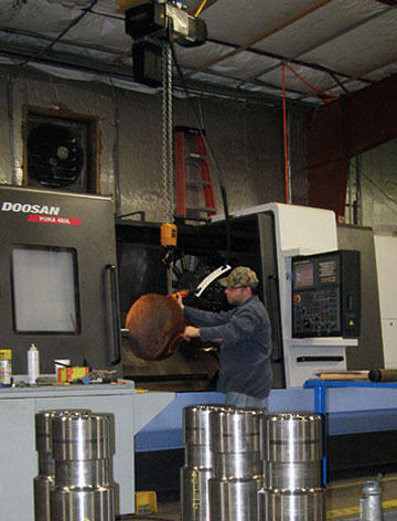 This lathe machines the company’s larger rockdrilling bits, including some that went into drills sent to rescue the miners in Chile.