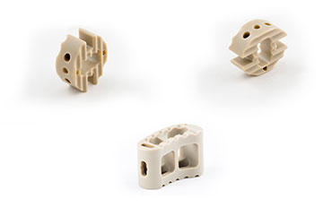 Complex geometry on every surface of these spinal fusion cages requires 5-axis machining for efficiency.