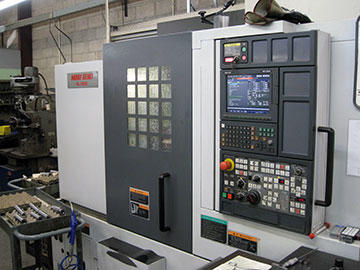 Altech looks much different from when it first adopted GibbsCAM for its first CNC machine, a chucker retrofit incorporating a control with a single-line display. This dual-spindle Mori Seiki NL-1500, one of 10 Mori CNCs on the shop floor, is considered a workhorse at Altech, Mr. Dufford says.