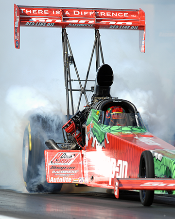 Driver Doug Herbert warms up the tires of the Snap-on Tools dragster, which is equipped with a CNC Performance Engineering clutch. CNC Performance also provides Herbert’s performance parts company with other machined parts.