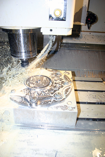 Profile milling of the CNC Performance clutch plate cover with a half-inch end mill on Daewoo 5020 vertical mill.