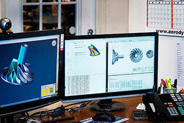 The upper components of a type of intake manifold made by Switzer Dynamics, showing the machine finish left from programming with GibbsCAM VoluMill, a high speed machining module that enables fast programming and fast machining, while extending tool life.