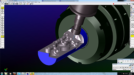 For highly complex parts, TraTek uses GibbsCAM Machine Simulation, which shows material removal and interaction between moving machine components, with collision detection, as a precaution against interference and collision, as in this simulation of five-axis toolpath finishing radii and fillets.