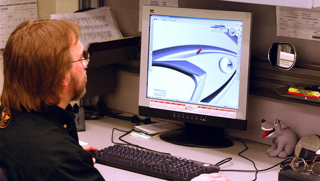 Jerome Jasmer uses GibbsCAM’s Cut Part Rendering simulation to study tooling marks in problem grooves on the Victory Vegas Jackpot passenger seat bracket.